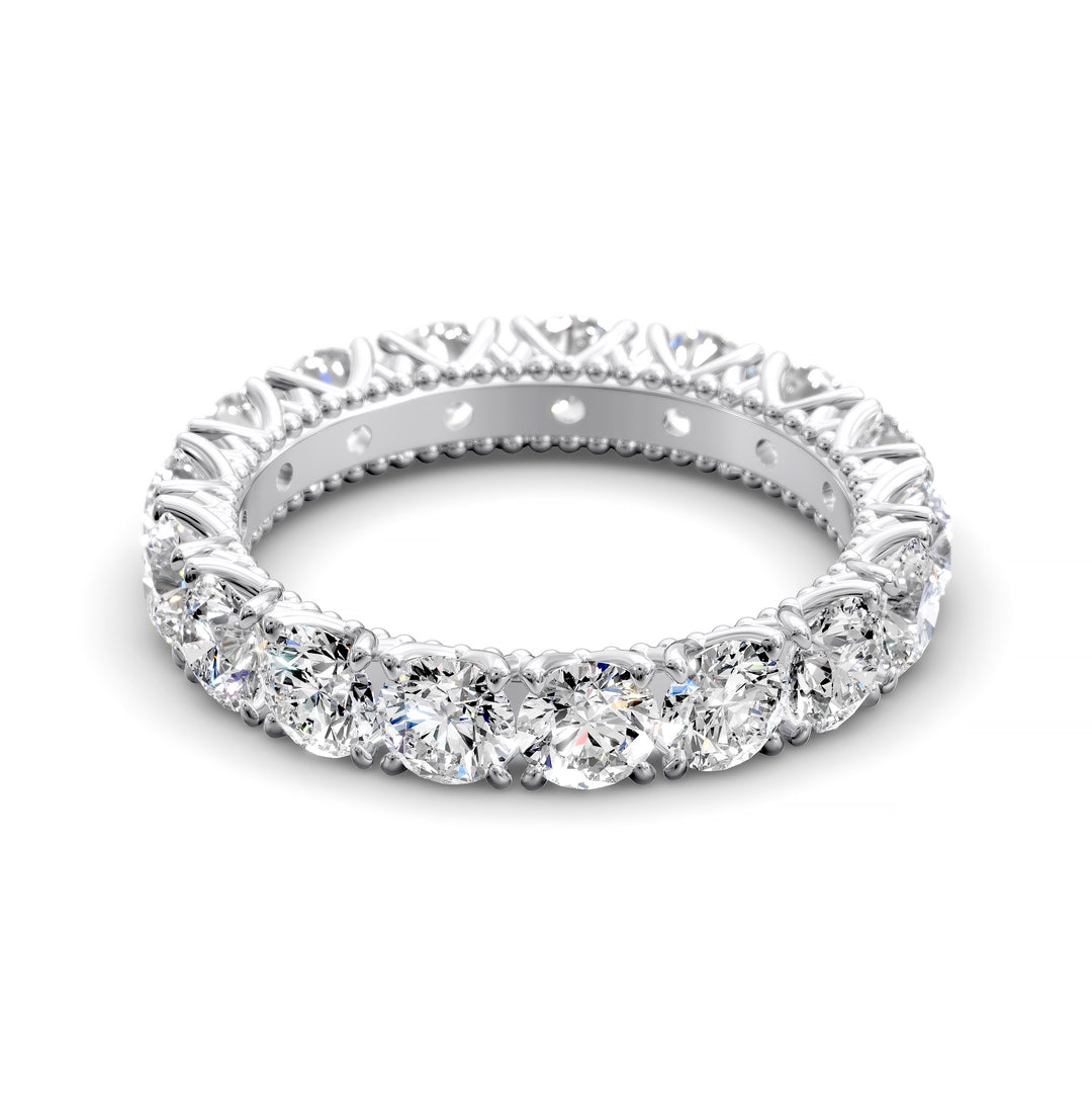 Vintage-inspired eternity band with round cut diamonds and intricate scalloped setting