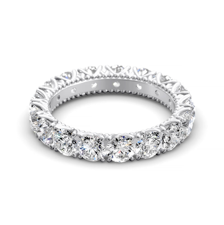 Vintage-inspired eternity band with round cut diamonds and intricate scalloped setting