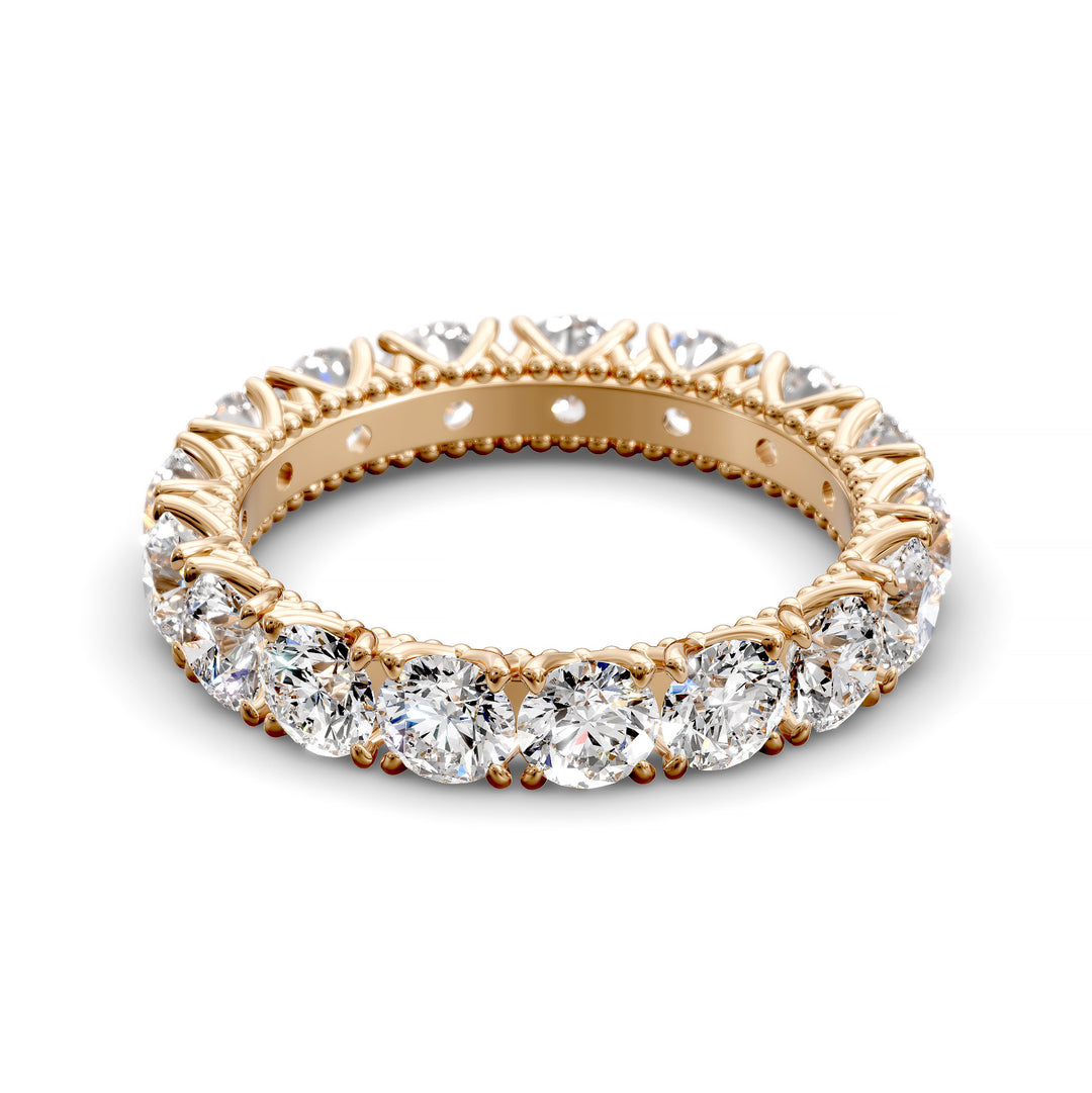Vintage-inspired eternity band with round cut diamonds and intricate scalloped setting