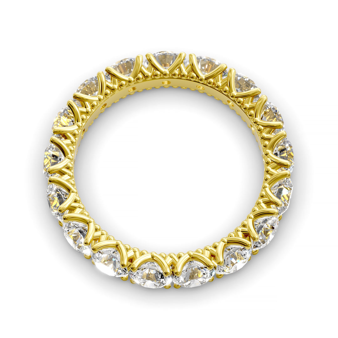 Vintage-inspired eternity band with round cut diamonds and intricate scalloped setting