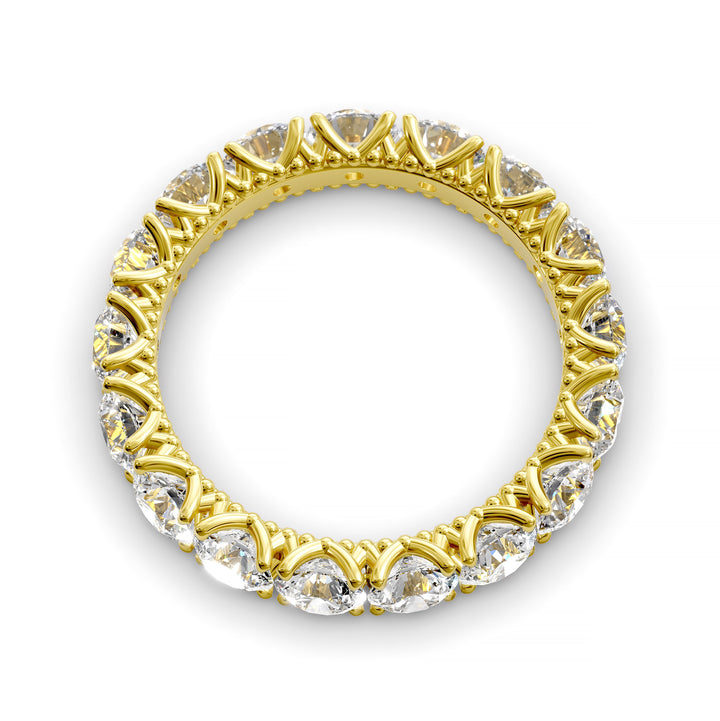 Vintage-inspired eternity band with round cut diamonds and intricate scalloped setting
