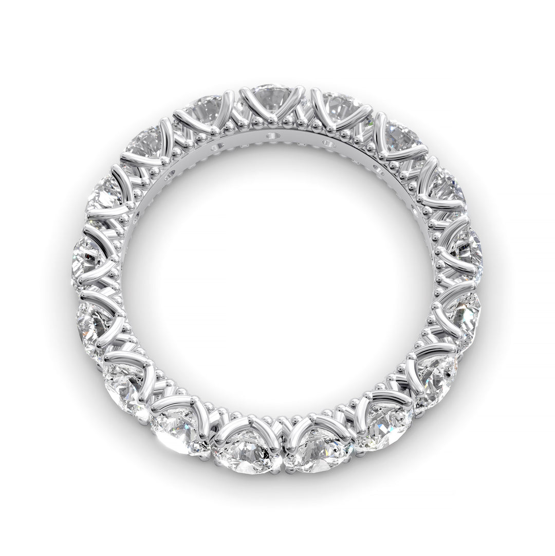 Vintage-inspired eternity band with round cut diamonds and intricate scalloped setting